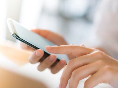 Business hand with mobile phone